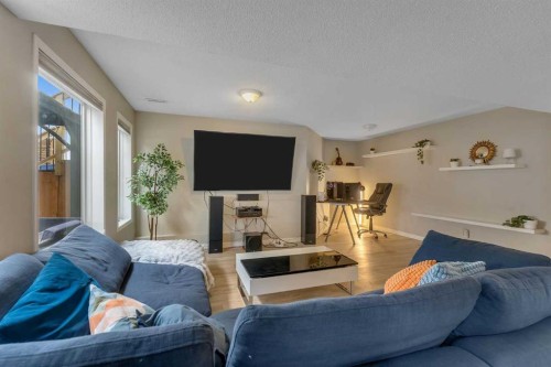 44 Douglas Glen Crescent Se, Calgary, AB - Indoor Photo Showing Living Room