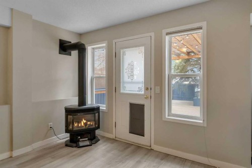 44 Douglas Glen Crescent Se, Calgary, AB - Indoor With Fireplace