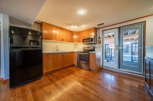 4604 Namaka Crescent Nw, Calgary, AB - Indoor Photo Showing Kitchen With Stainless Steel Kitchen