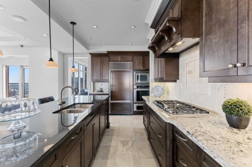 2801-910 5 Avenue Sw, Calgary, AB - Indoor Photo Showing Kitchen With Stainless Steel Kitchen With Double Sink With Upgraded Kitchen