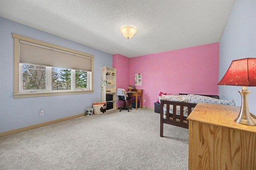 8 Ypres Lane Sw, Calgary, AB - Indoor Photo Showing Bedroom