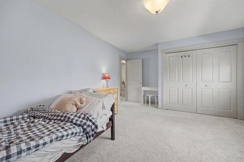 8 Ypres Lane Sw, Calgary, AB - Indoor Photo Showing Bedroom
