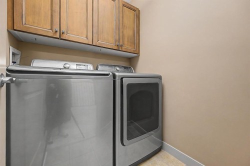 8 Ypres Lane Sw, Calgary, AB - Indoor Photo Showing Laundry Room