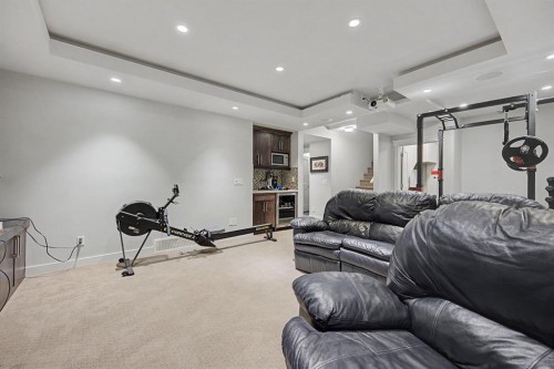 8 Ypres Lane Sw, Calgary, AB - Indoor Photo Showing Gym Room