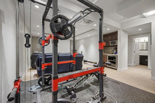 8 Ypres Lane Sw, Calgary, AB - Indoor With Fireplace