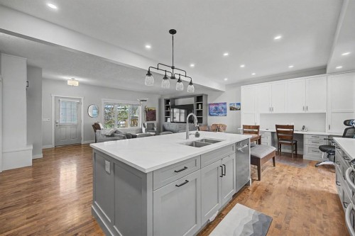8 Ypres Lane Sw, Calgary, AB - Indoor Photo Showing Kitchen With Double Sink