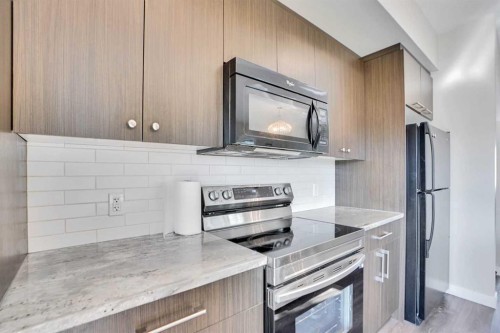 1107-333 Taralake Way Ne, Calgary, AB - Indoor Photo Showing Kitchen