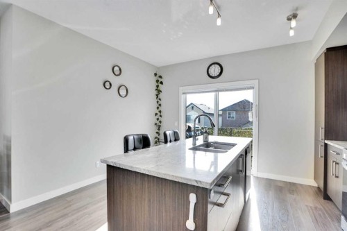 1107-333 Taralake Way Ne, Calgary, AB - Indoor Photo Showing Kitchen With Double Sink