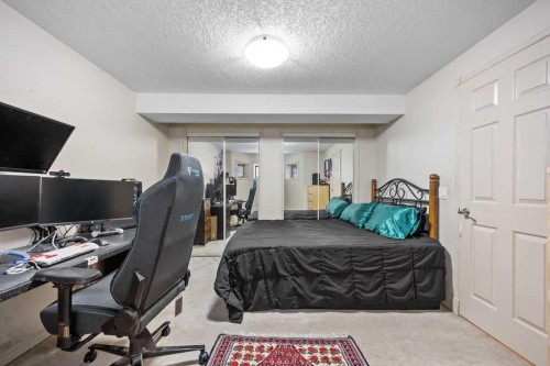 4 Prominence Path Sw, Calgary, AB - Indoor Photo Showing Bedroom