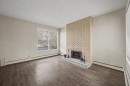 4004 79 Street Nw, Calgary, AB  - Indoor Photo Showing Other Room With Fireplace 