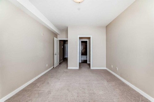 206-1005B Westmount Drive, Strathmore, AB - Indoor Photo Showing Other Room
