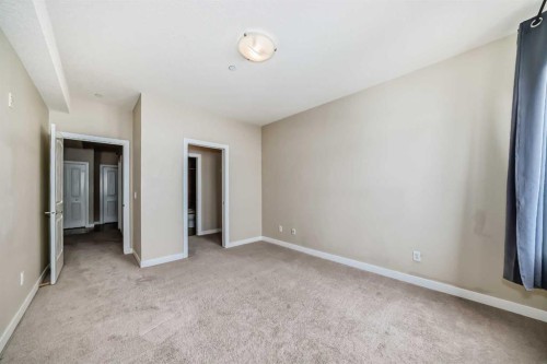 206-1005B Westmount Drive, Strathmore, AB - Indoor Photo Showing Other Room