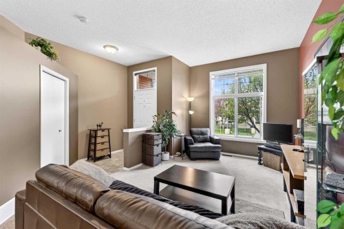 140 Promenade Way Se, Calgary, AB - Indoor Photo Showing Living Room