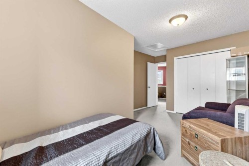 140 Promenade Way Se, Calgary, AB - Indoor Photo Showing Bedroom