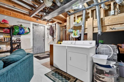 140 Promenade Way Se, Calgary, AB - Indoor Photo Showing Laundry Room