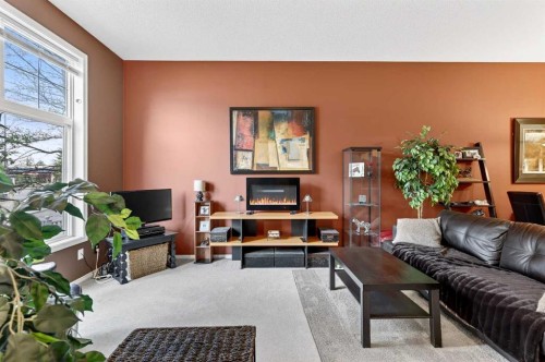 140 Promenade Way Se, Calgary, AB - Indoor Photo Showing Living Room