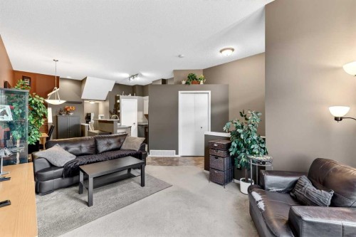 140 Promenade Way Se, Calgary, AB - Indoor Photo Showing Living Room