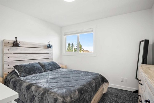 6005 Ash Street, Olds, AB - Indoor Photo Showing Bedroom