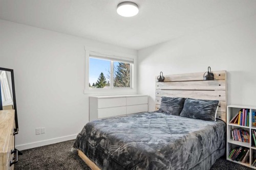 6005 Ash Street, Olds, AB - Indoor Photo Showing Bedroom