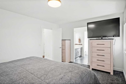 6005 Ash Street, Olds, AB - Indoor Photo Showing Bedroom