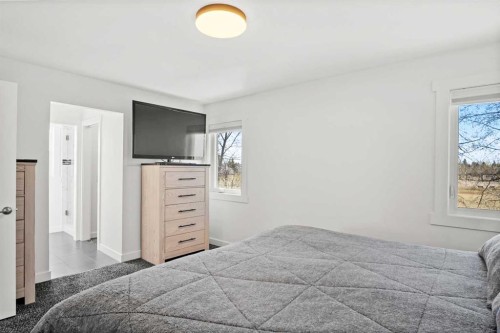 6005 Ash Street, Olds, AB - Indoor Photo Showing Bedroom