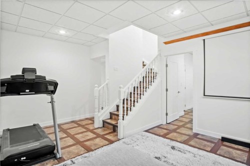 6005 Ash Street, Olds, AB - Indoor Photo Showing Gym Room