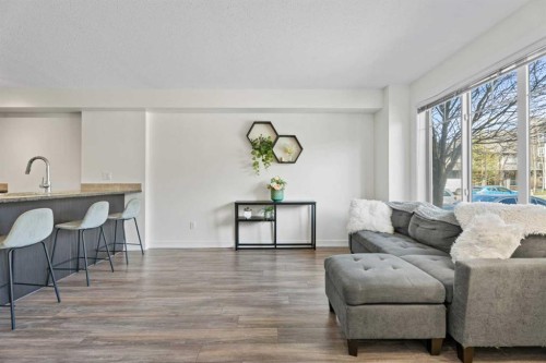 410-121 Copperpond Common Se, Calgary, AB - Indoor Photo Showing Living Room