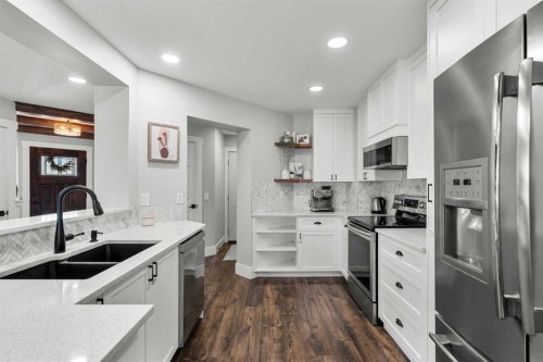 200 Douglas Ridge Circle Se, Calgary, AB - Indoor Photo Showing Kitchen With Stainless Steel Kitchen With Double Sink With Upgraded Kitchen