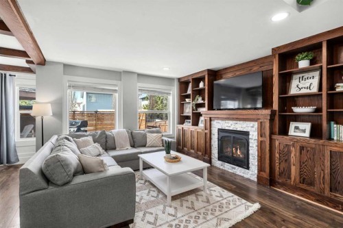 200 Douglas Ridge Circle Se, Calgary, AB - Indoor Photo Showing Living Room With Fireplace