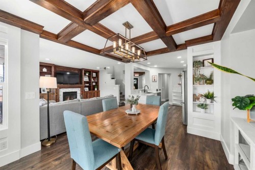 200 Douglas Ridge Circle Se, Calgary, AB - Indoor Photo Showing Dining Room With Fireplace