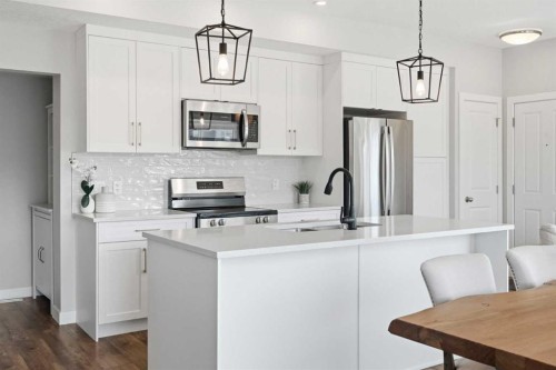 362 Canals Crossing Sw, Airdrie, AB - Indoor Photo Showing Kitchen With Upgraded Kitchen