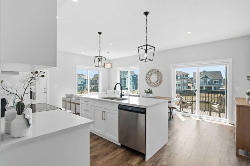 362 Canals Crossing Sw, Airdrie, AB - Indoor Photo Showing Kitchen With Double Sink With Upgraded Kitchen