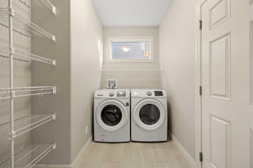 35 Tuscany Estates Crescent Nw, Calgary, AB - Indoor Photo Showing Laundry Room
