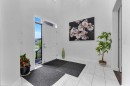 205 Kinniburgh Cove, Chestermere, AB  - Indoor Photo Showing Other Room 