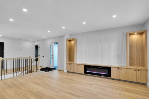 77 Ferncliff Crescent Se, Calgary, AB - Indoor Photo Showing Other Room With Fireplace