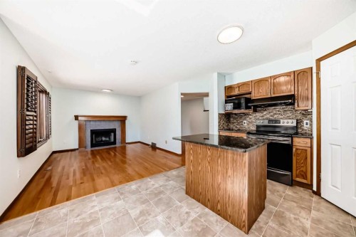 164 Macewan Park Circle Nw, Calgary, AB - Indoor With Fireplace