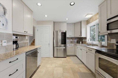 40 Grafton Crescent Sw, Calgary, AB - Indoor Photo Showing Kitchen With Stainless Steel Kitchen With Double Sink