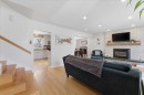 40 Grafton Crescent Sw, Calgary, AB  - Indoor Photo Showing Living Room With Fireplace 