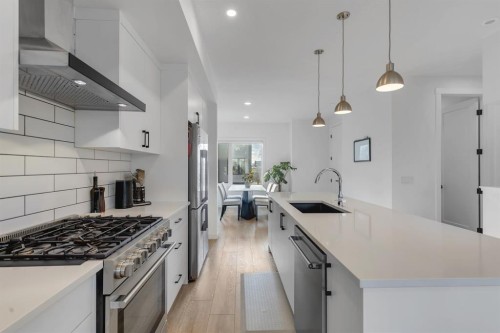 213 Greenbriar Common, Calgary, AB - Indoor Photo Showing Kitchen With Stainless Steel Kitchen With Upgraded Kitchen