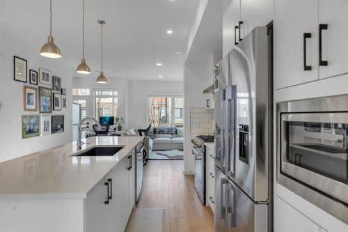 213 Greenbriar Common, Calgary, AB - Indoor Photo Showing Kitchen With Stainless Steel Kitchen With Upgraded Kitchen