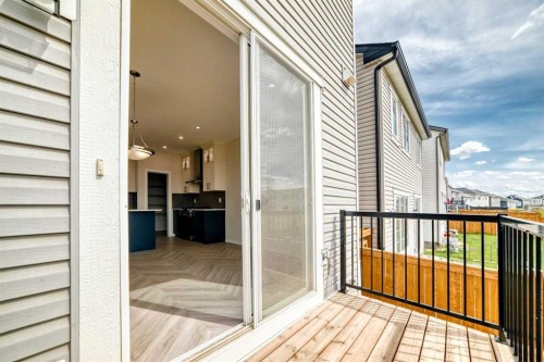 641 Windrow Manor Sw, Airdrie, AB - Outdoor With Deck Patio Veranda With Exterior