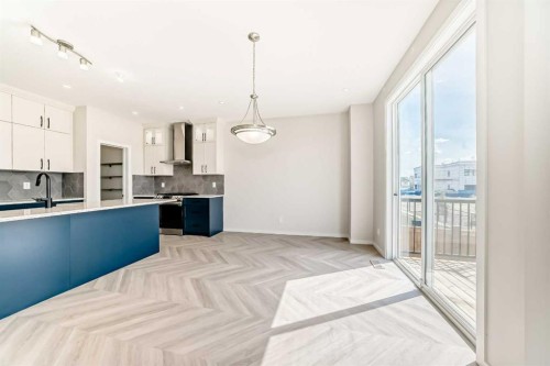 641 Windrow Manor Sw, Airdrie, AB - Indoor Photo Showing Kitchen With Upgraded Kitchen