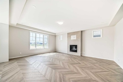 641 Windrow Manor Sw, Airdrie, AB - Indoor With Fireplace