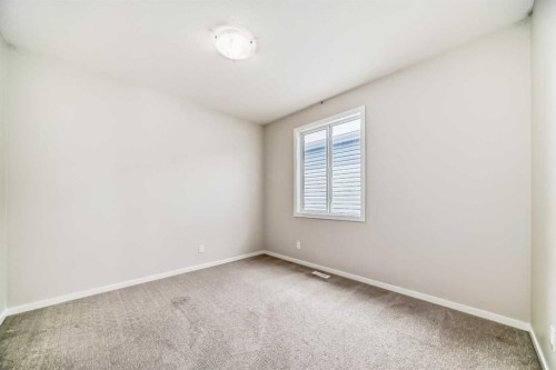 641 Windrow Manor Sw, Airdrie, AB - Indoor Photo Showing Other Room