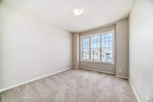 641 Windrow Manor Sw, Airdrie, AB - Indoor Photo Showing Other Room