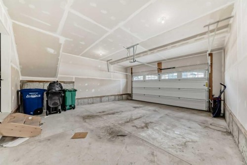 641 Windrow Manor Sw, Airdrie, AB - Indoor Photo Showing Garage