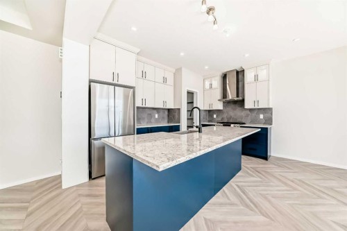 641 Windrow Manor Sw, Airdrie, AB - Indoor Photo Showing Kitchen With Upgraded Kitchen