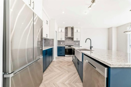 641 Windrow Manor Sw, Airdrie, AB - Indoor Photo Showing Kitchen With Upgraded Kitchen