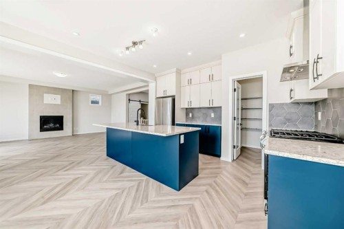 641 Windrow Manor Sw, Airdrie, AB - Indoor Photo Showing Kitchen With Upgraded Kitchen