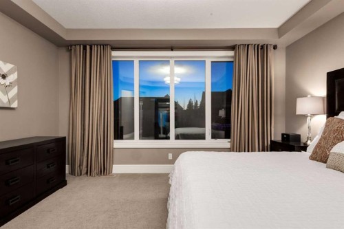 64 Mystic Ridge Way Sw, Calgary, AB - Indoor Photo Showing Bedroom